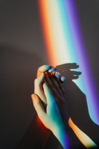 persons-hands-with-rainbow-colors-3693914