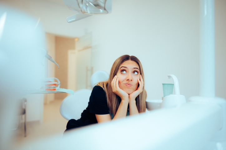 Stressed Patient Waiting in a Dental Office Feeling Fearful